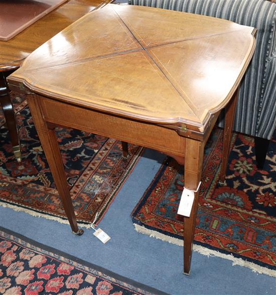 An Edwardian satinwood banded mahogany envelope card table W.60cm